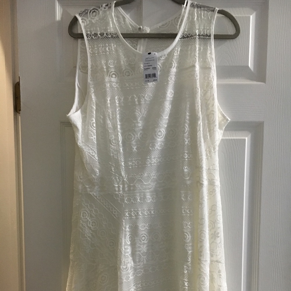 White knee length dress.